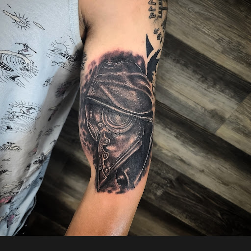 Explore monopoly man tattoo ideas, creative tattoo ideas in Wasilla, available at Doulos Tattoo, The Tattoo Shop