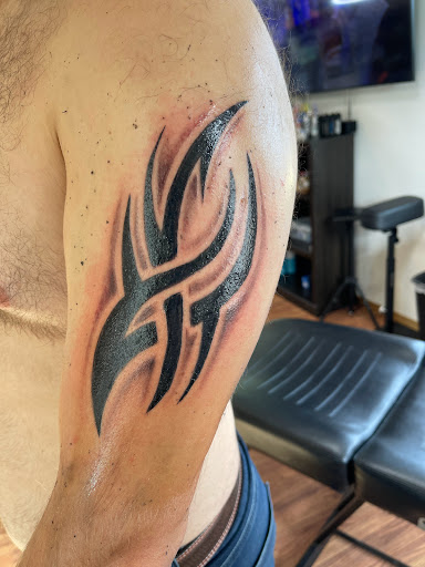 Explore tattoo ideas for name cover up, creative tattoo ideas in Butler, available at Kryptic Skin Tattoo