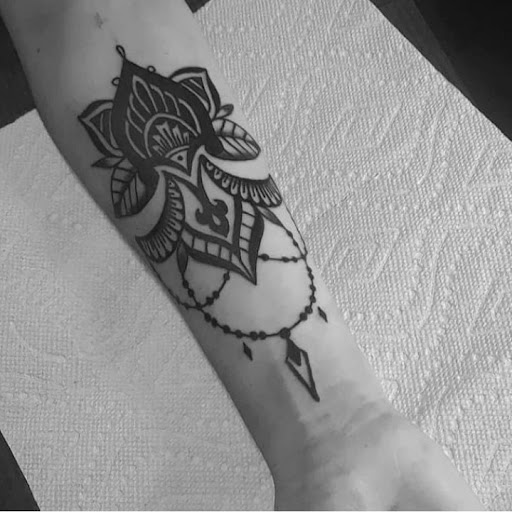 Explore rose tattoo ideas forearm, creative tattoo ideas in Greenville, available at The Gallery Tattoo Greenville