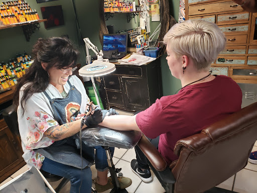 Explore twin tattoos ideas, creative tattoo ideas in Liberty, available at Yahweh Approved Tattoos and Piercings
