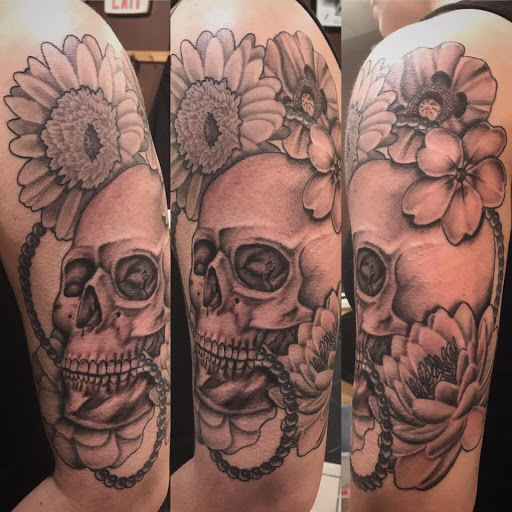 Explore tattoo filler ideas for guys, creative tattoo ideas in Amherst, available at Wanderlust Tattoo & Piercing