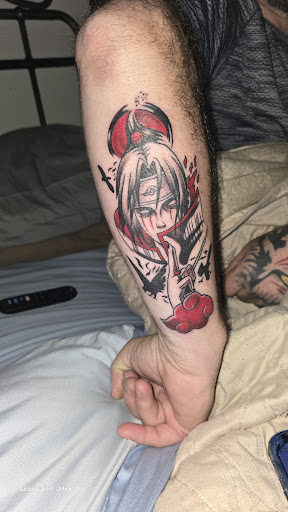 Explore collar tattoo ideas, creative tattoo ideas in Greer, available at Inkslingers Electric Tattooing