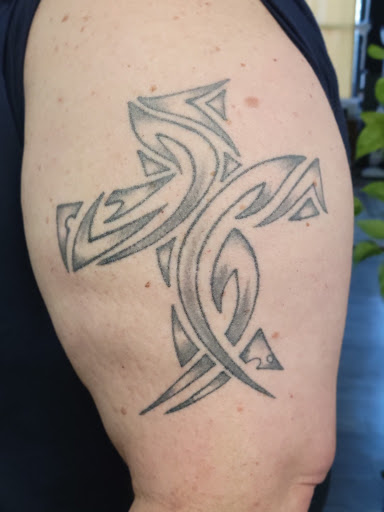 Explore military dog tag tattoo ideas, creative tattoo ideas in Georgetown, available at White Dog Tattoo