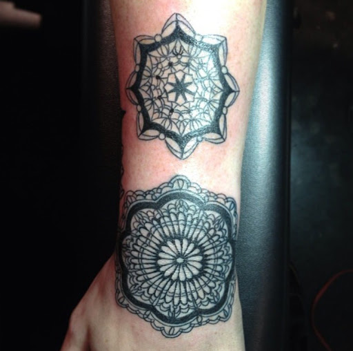 Explore hood neck tattoo ideas, creative tattoo ideas in San Diego, available at Sideshow Tattoo and Piercing