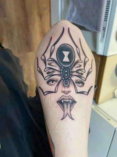 Explore dog collar tattoo ideas, creative tattoo ideas in Wenatchee, available at Ole Soul Studio