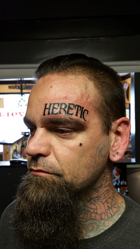 Explore tattoo ideas on leg for men, creative tattoo ideas in Foley, available at Black Sheep Custom Tattoos and Piercings