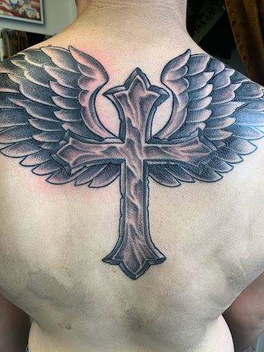 Explore trapped tattoo ideas, creative tattoo ideas in Fall River, available at Indelible Ink Tattoo Studio 2.0