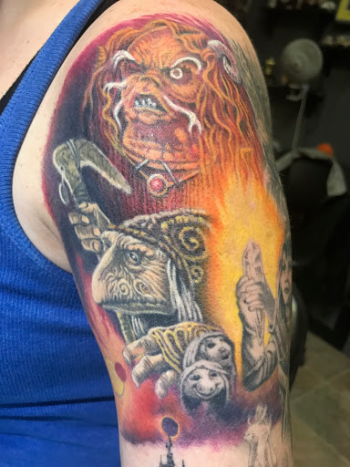 Explore wolf neck tattoo ideas, creative tattoo ideas in Wilmington, available at Wildcard Studios