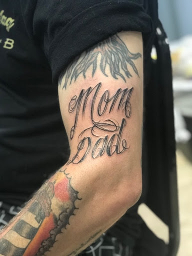 Explore earlobe tattoo ideas, creative tattoo ideas in Orange Park, available at Diamond Tip Tattoo