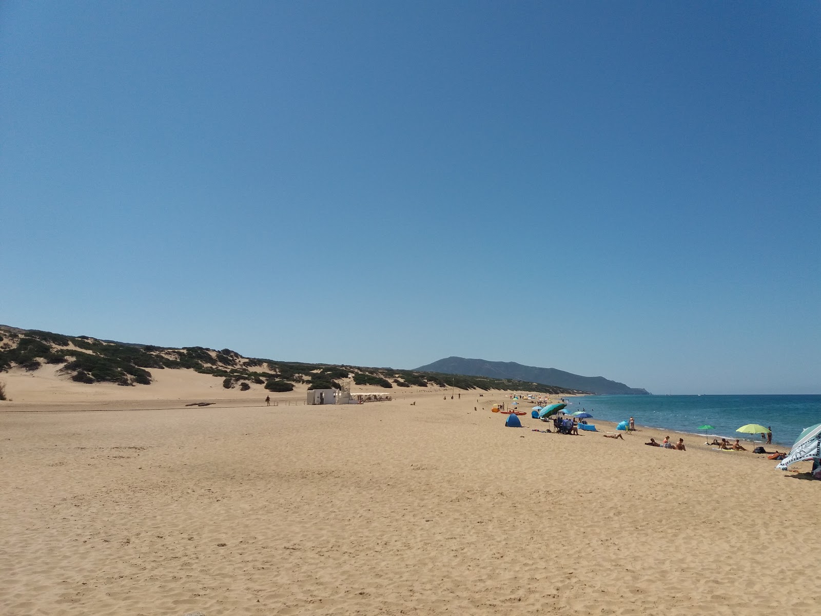 Photo of Piscinas Beach located in natural area