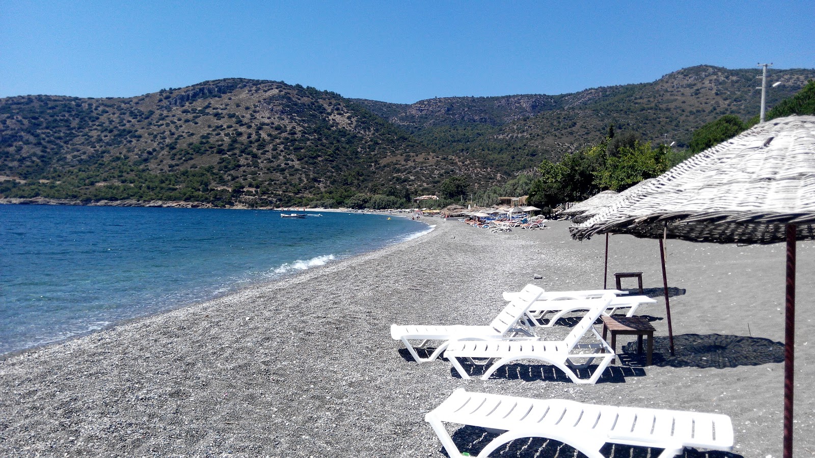 Foto av Ovabuku beach med turkos rent vatten yta