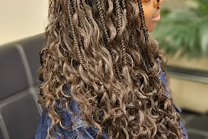 Ngozi hair braiding and beauty supply image