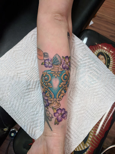 Explore evolution tattoo ideas, creative tattoo ideas in New Hartford, available at Bodily Charm Tattoo & Piercing