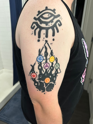 Explore tattoo ideas for female thigh, creative tattoo ideas in Salem, available at Mayhem Tattoo