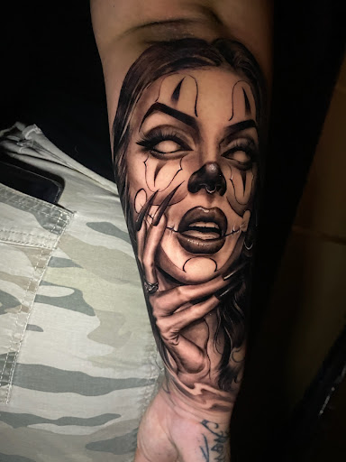 Explore female spine tattoo ideas, creative tattoo ideas in Albany, available at Primal Instincts Body Art Studio