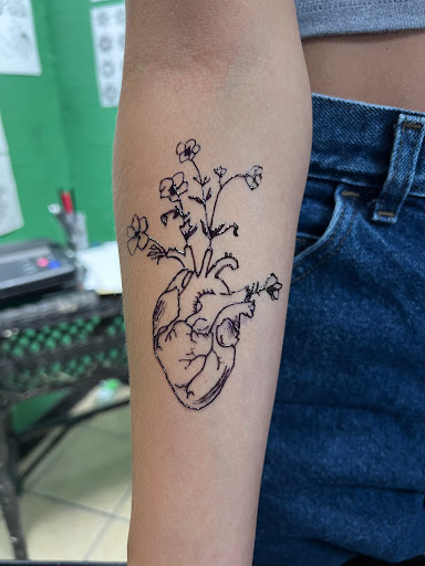 Explore c section scar tattoo ideas, creative tattoo ideas in Port Aransas, available at SHARK ATTACK TATTOO