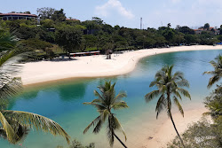 Palawan Beach'in fotoğrafı geniş bir kıyı şeridi ile birlikte