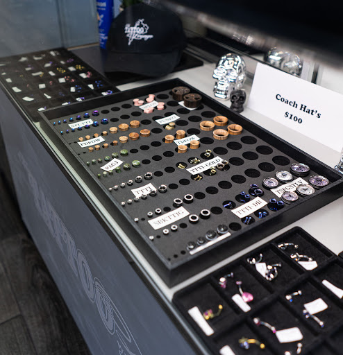 Explore pooh bear tattoo ideas, creative tattoo ideas in Mesa, available at The Tattoo Lounge