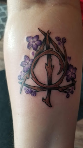 Explore simple forearm tattoo ideas, creative tattoo ideas in Northfield, available at Kinship Collective Tattoo