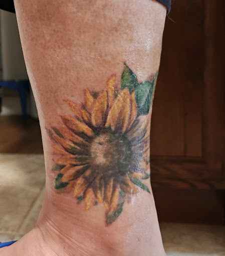 Explore sleeve cover up tattoo ideas, creative tattoo ideas in Walnut Cove, available at Wildfire Tattoo Studio