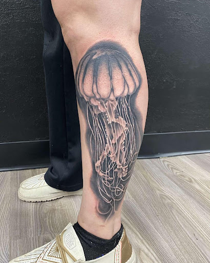 Explore small behind ear tattoo ideas, creative tattoo ideas in La Crosse, available at Nickel & Brass Tattoo Collective