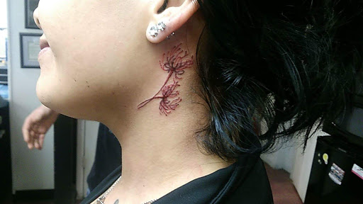 Explore little hand tattoo ideas, creative tattoo ideas in Longview, available at Fugis Tattoo Shop