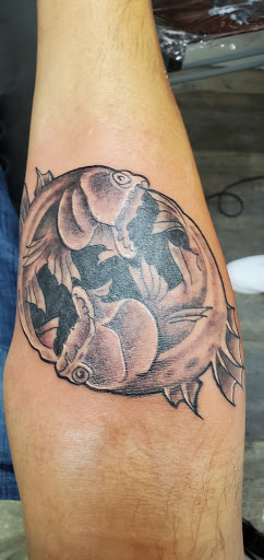 Explore tricep tattoo ideas for men, creative tattoo ideas in Saint Paul, available at St Paul Tattoo