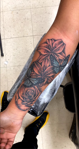 Explore mardi gras mask tattoo ideas, creative tattoo ideas in Eden, available at R1sk Takers Ink Tattoo and Piercing Lounge