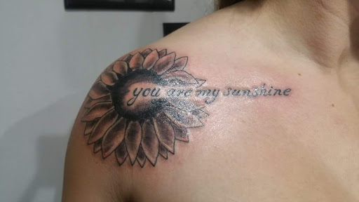 Explore name cover up tattoo ideas, creative tattoo ideas in Brunswick, available at Street Life Tattoos