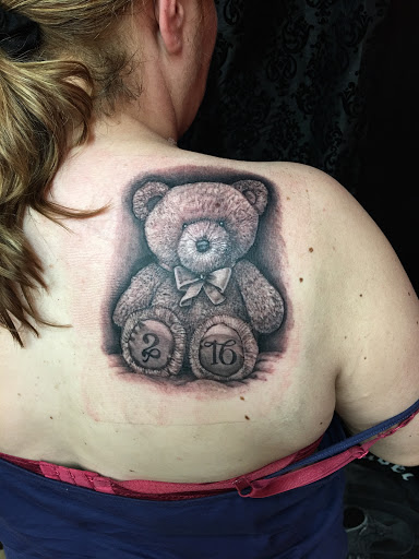 Explore the 1975 tattoo ideas, creative tattoo ideas in Anniston, available at Infinity Ink