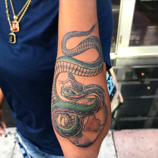 Explore small face tattoo ideas, creative tattoo ideas in Miami Beach, available at Salvation Tattoo Lounge
