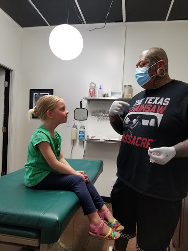 Explore man in the arena tattoo ideas, creative tattoo ideas in Austin, available at Shaman Modifications Tattoo and Body Piercing North Austin