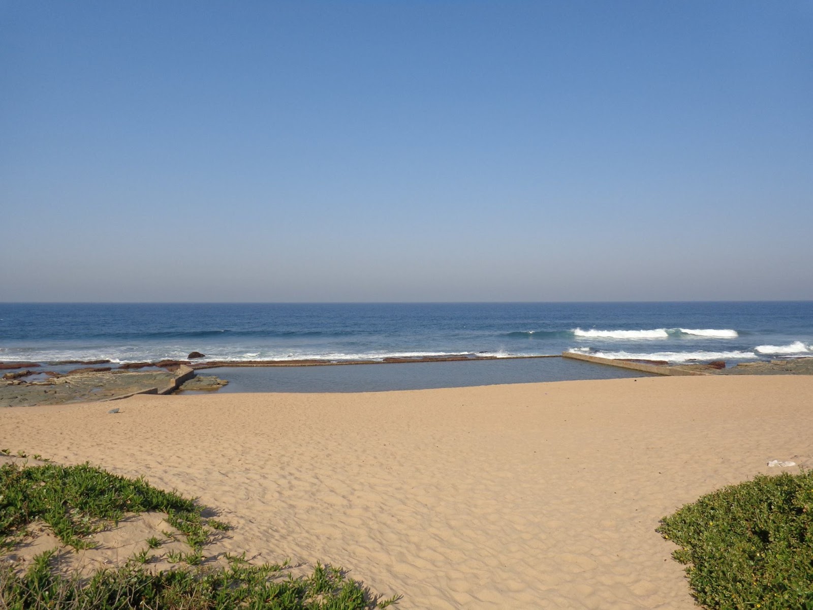 Photo of Mtwalume beach with bright sand surface