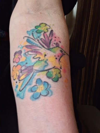 Explore assassins creed tattoo ideas, creative tattoo ideas in Leavenworth, available at Bearded Lady Tattoo and Piercing Studio