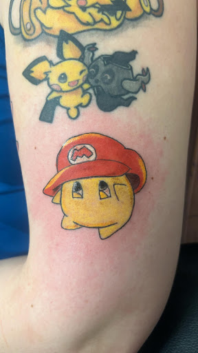 Explore 3/4 sleeve tattoo ideas, creative tattoo ideas in Wisconsin Dells, available at Twisted Dimensions Tattoo Studio