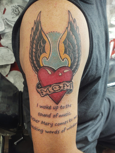 Explore demon slayer tattoo idea, creative tattoo ideas in Grand Forks, available at Branded Man Tattoo