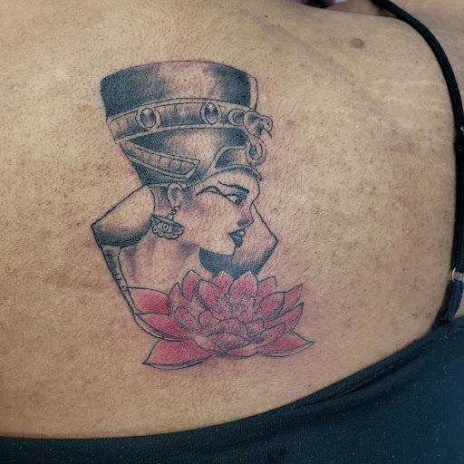 Explore black flower tattoo ideas, creative tattoo ideas in Houston, available at 333 Tattoo Studio HTX