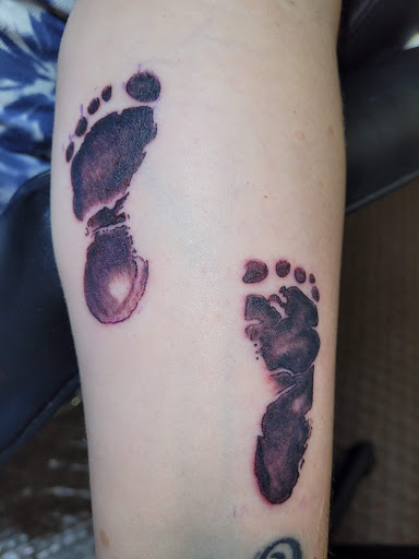 Explore epic tattoo ideas, creative tattoo ideas in Angola, available at Hoodlum Ink