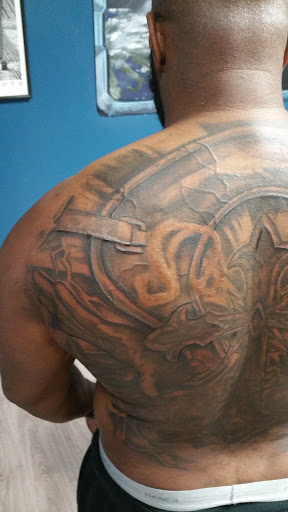 Explore tummy tattoo ideas, creative tattoo ideas in Augusta, available at The Lucky Seven Tattoo Co.