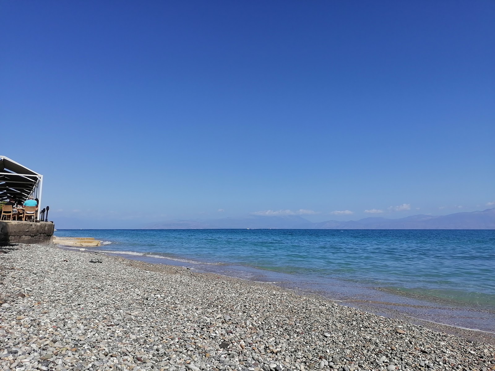 Foto von Paralia Xilokastrou und die siedlung