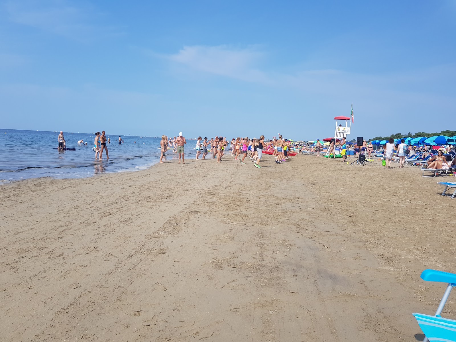 Foto von Spiaggia Grado Pineta mit beiger sand Oberfläche