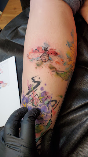 Explore cross tattoo sleeve ideas, creative tattoo ideas in Fresno, available at Happy Client Tattoo