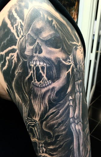 Explore playing card tattoo ideas, creative tattoo ideas in Poughkeepsie, available at Tattoo Voodoo