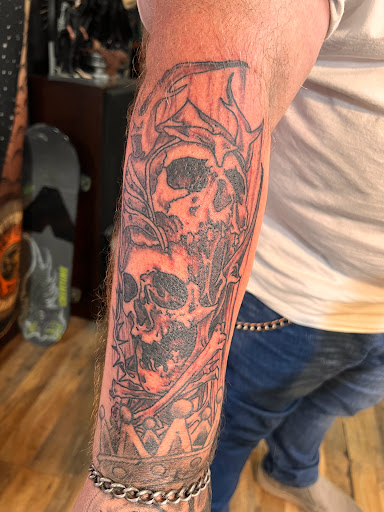 Explore tattoo ideas for passed loved ones, creative tattoo ideas in Pikeville, available at The Carbon Canary Tattoo Studio