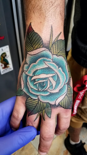 Explore father and daughter tattoos ideas, creative tattoo ideas in Green Bay, available at The Blue Gem Tattooing