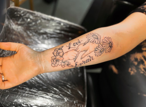 Explore tattoo time ideas, creative tattoo ideas in Sylvania, available at The Tattoo Shop