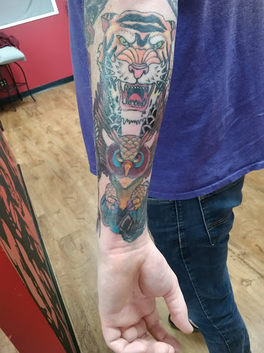 Explore strawberry tattoo ideas, creative tattoo ideas in Akron, available at Knuckle Up Ink Tattoos