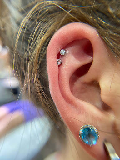 Explore tattoo ideas for military, creative tattoo ideas in Orange, available at Symbiosis Body Piercing