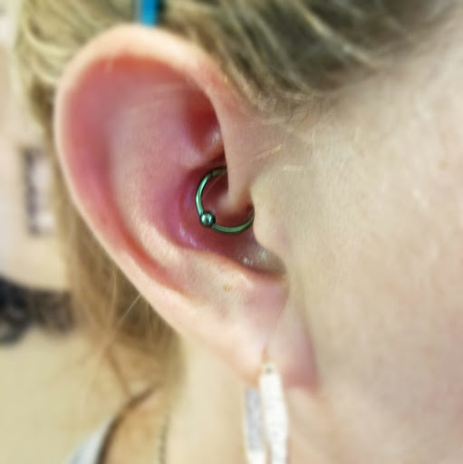 Explore packers tattoo ideas, creative tattoo ideas in Nampa, available at Hippie Hoops and Holes