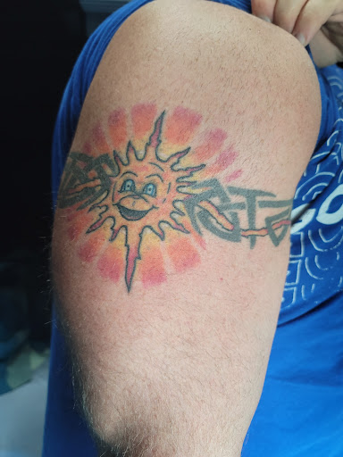 Explore tattoo ideas face, creative tattoo ideas in Holly, available at Loyalty Tattoo Company